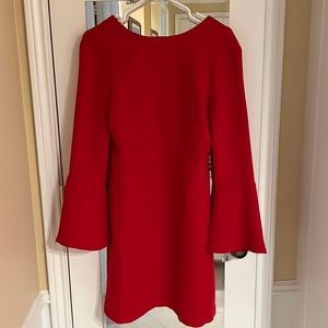 Classy mini red dress with flared sleeves and a cute cut-out in the back.